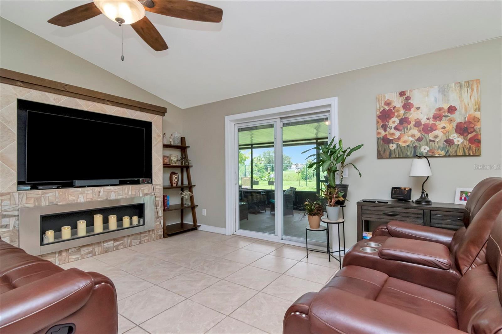 Sliding door lead to spacious screened patio