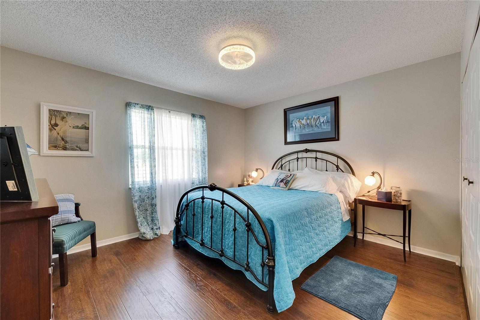 Guest bedroom has led ceiling fan/light