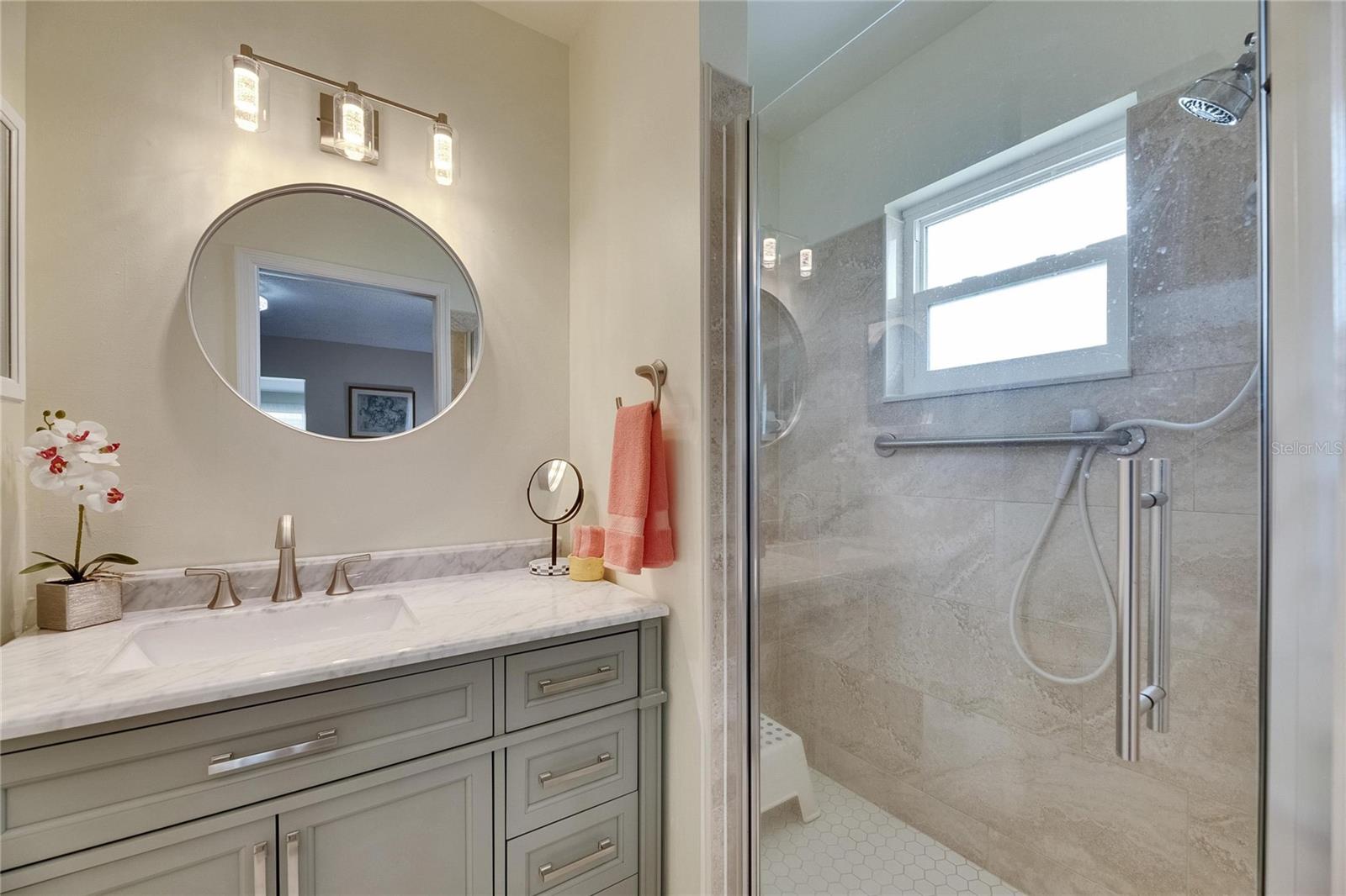 New vanity, mirror, and light