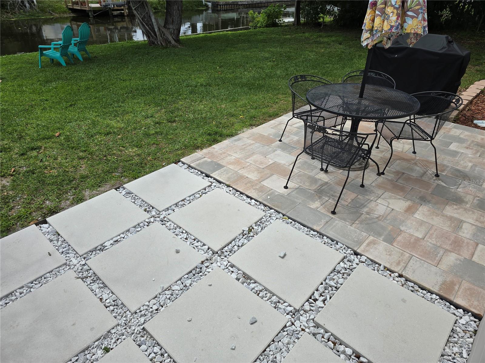 Patio Back yard and view of canal