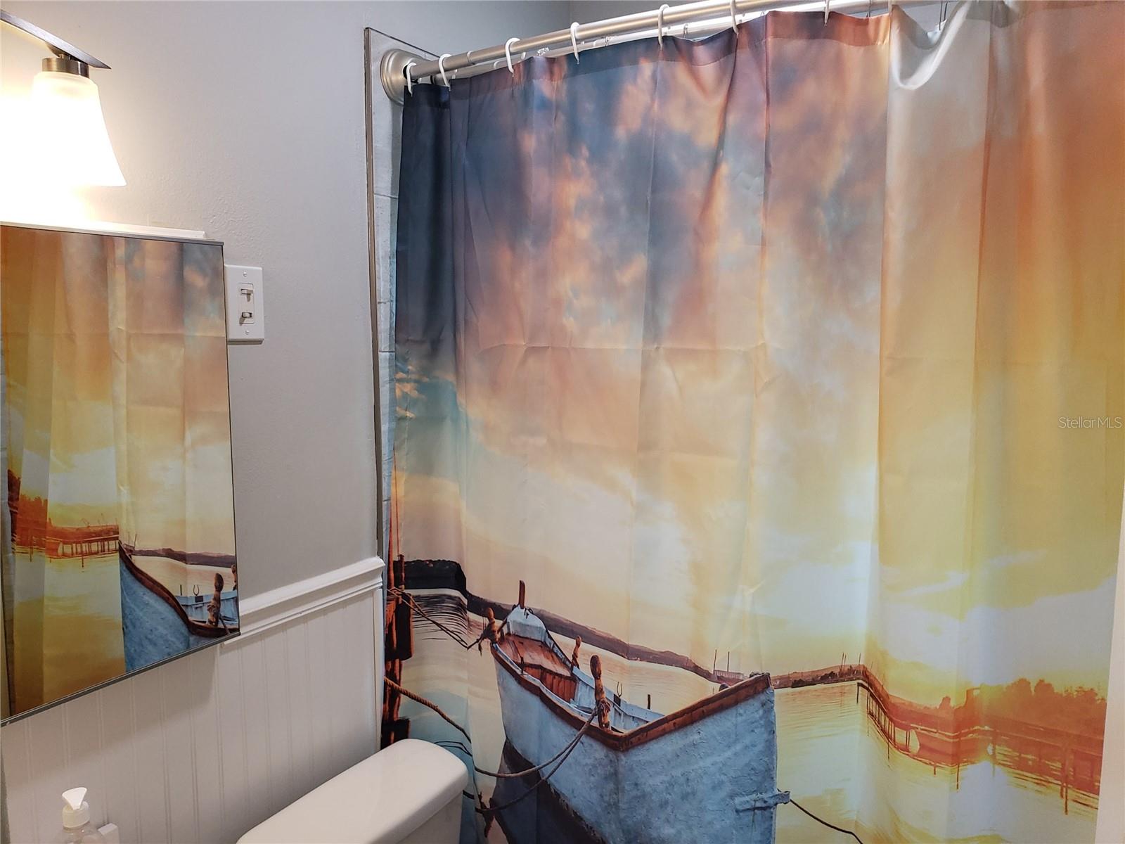 Bath with additional lighting and ceiling vents