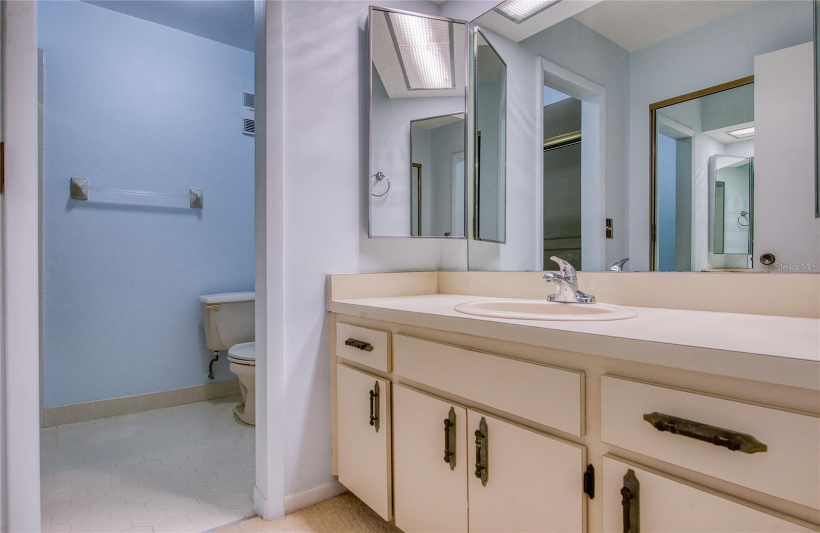 ALL BATH HAS SEPARATE BATH WITH GLASS ENCLOSURE AND TOILET