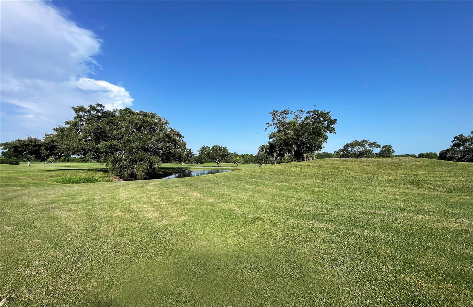 East Bay Golf Club right outside your door.