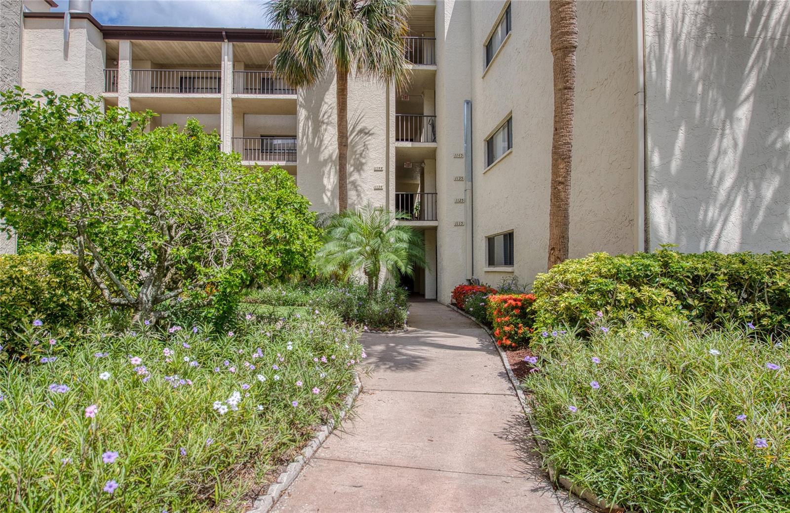 nicely landscaped courtyard entrance