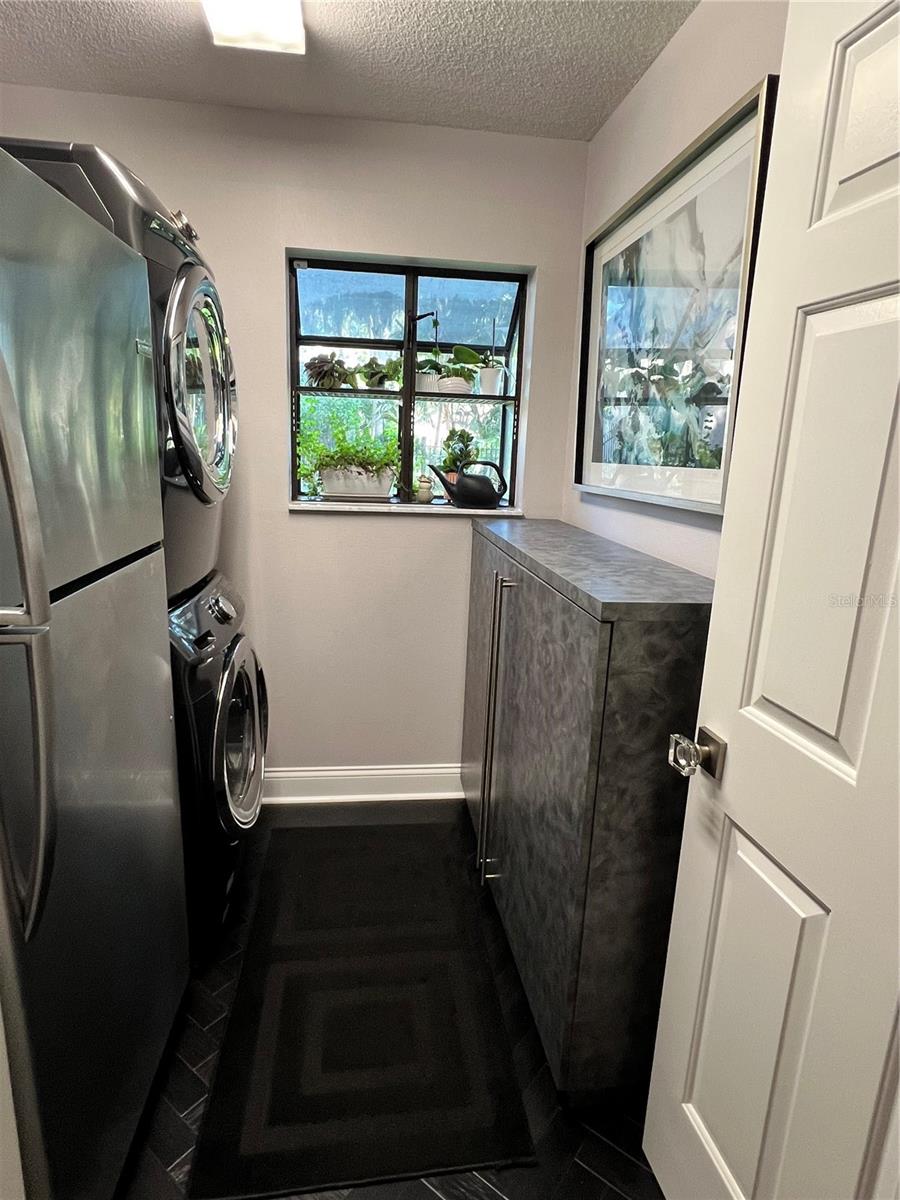 Laundry room with Greenhouse window,