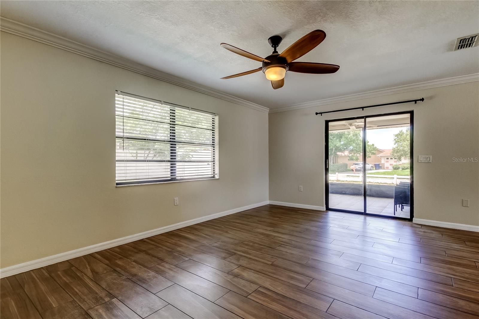 family room, sliders to screened patio