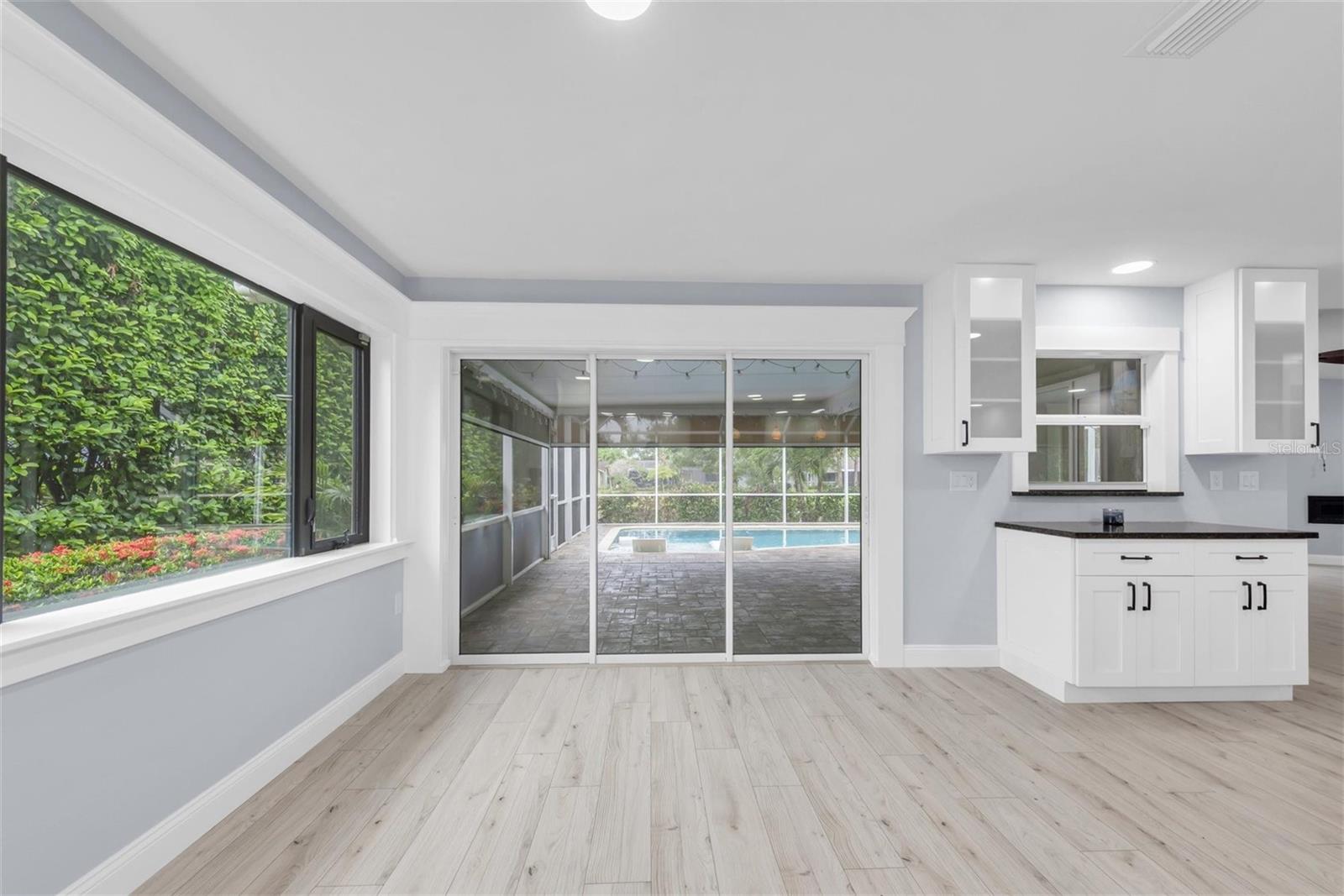 Off Kitchen, This Takes You Out To The Covered Lanai.
