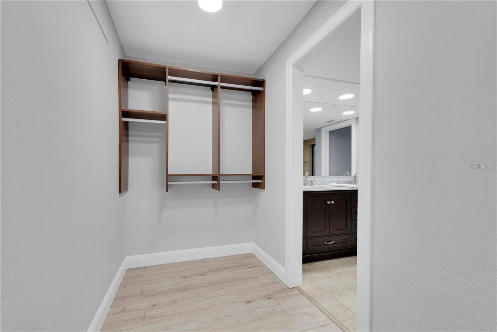 Spacious Walk-In Primary Closet.
