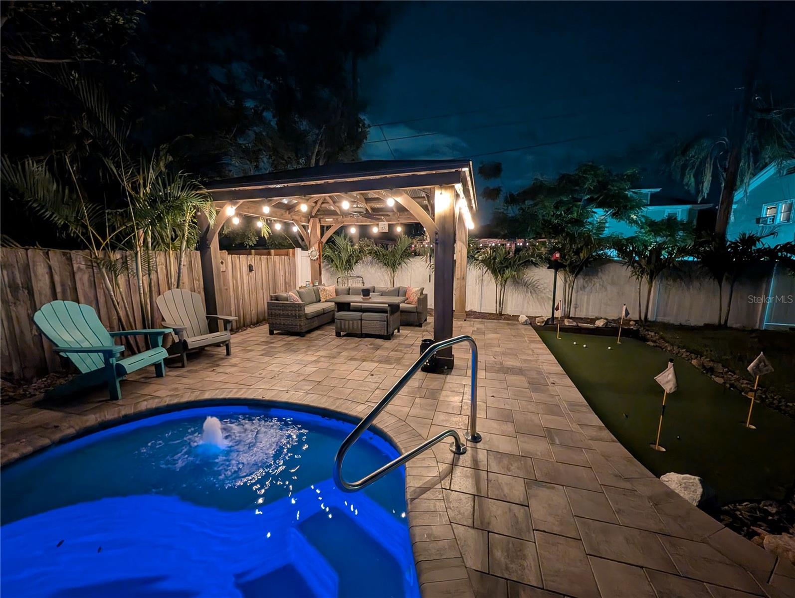 Beautiful pool and gazebo at night