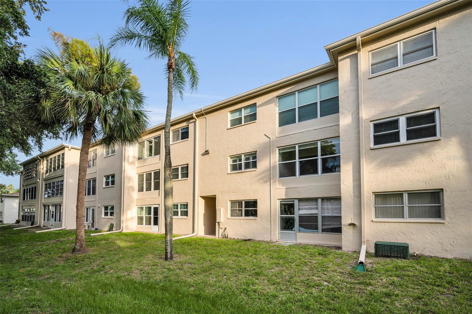 SEE THE SECOND FLOOR NEWER BALCONY WINDOWS.