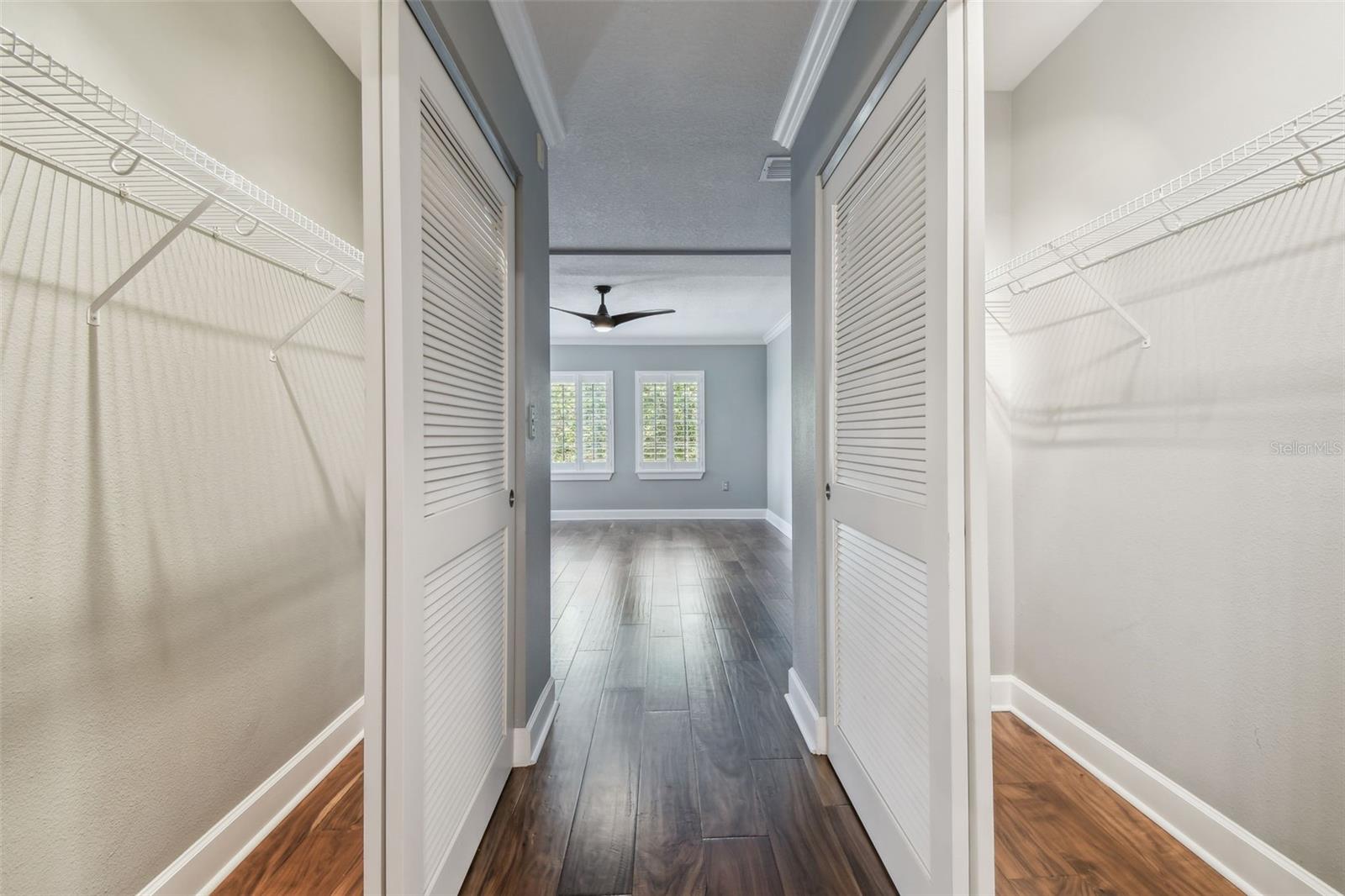Double closets in primary bedroom.