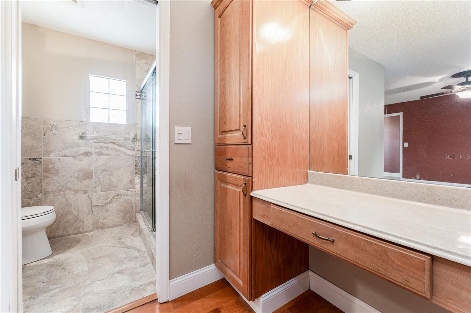 Primary EnSuite Dressing Area Leading to Updated Bath
