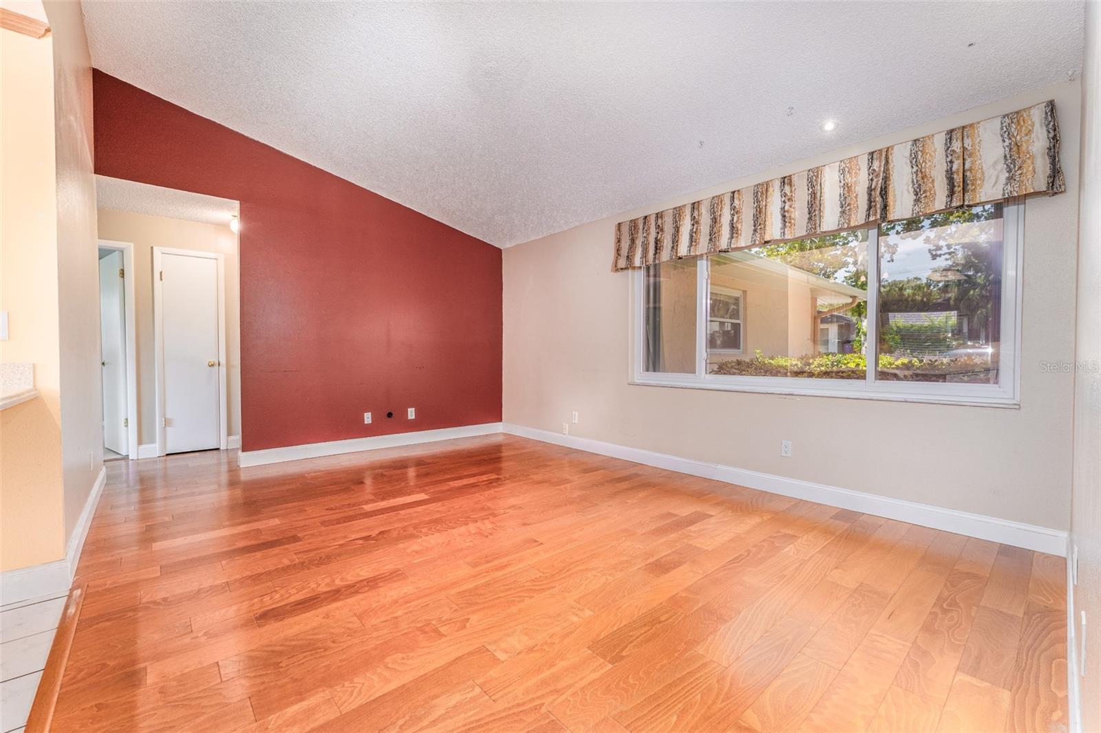Great Room Adjacent to Kitchen with Beautiful Window Overlooking Frontyard