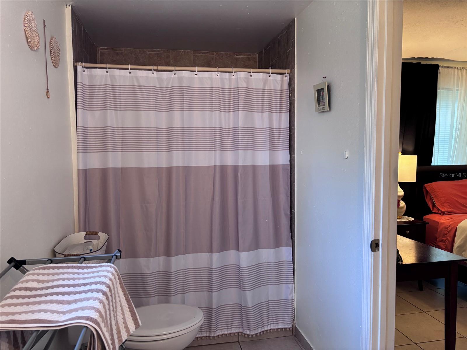 Master bedroom restroom with shower