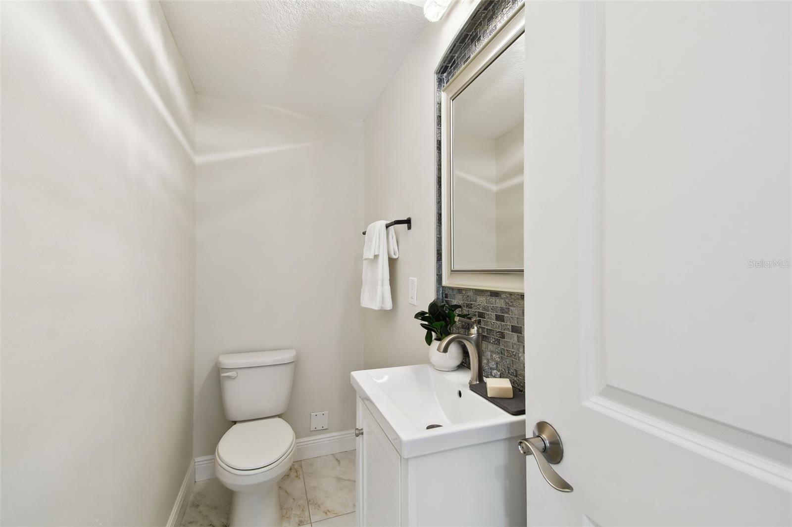 Half bath located on 1st floor
