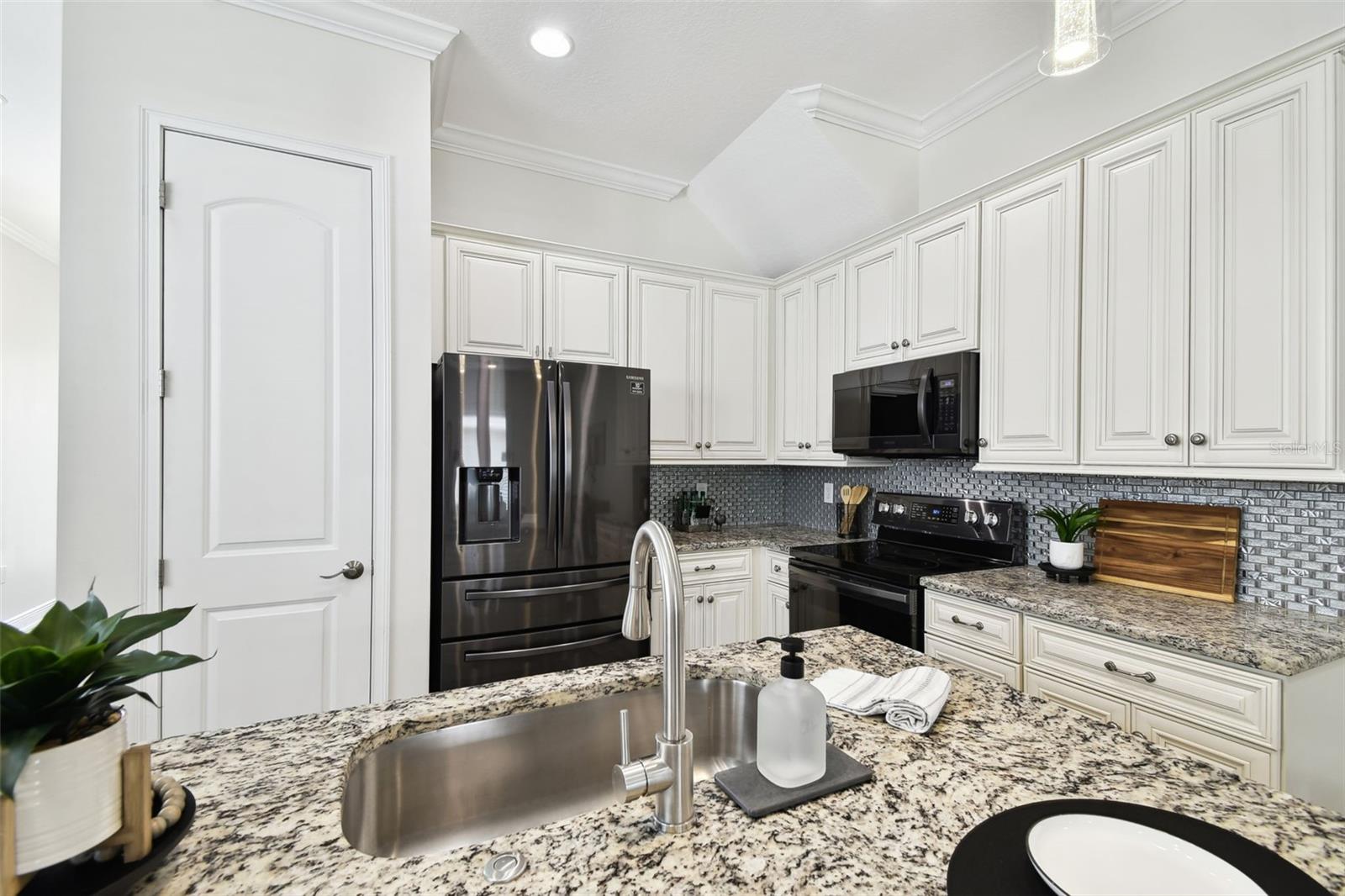 Exceptionally appointed kitchen - all appliances will convey