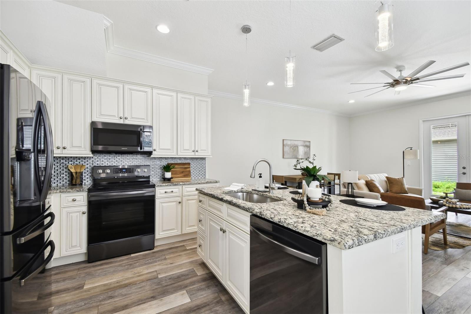 Kitchen opens up to dining & living rooms