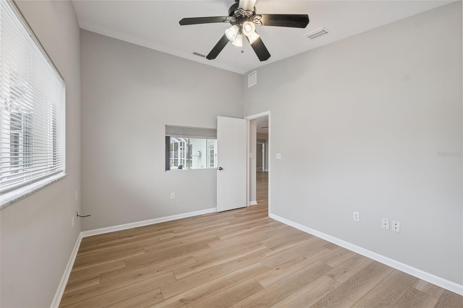 5th bedroom/office with peek-a-boo window for views into family room and out to pool (work and supervise children at the same time!)