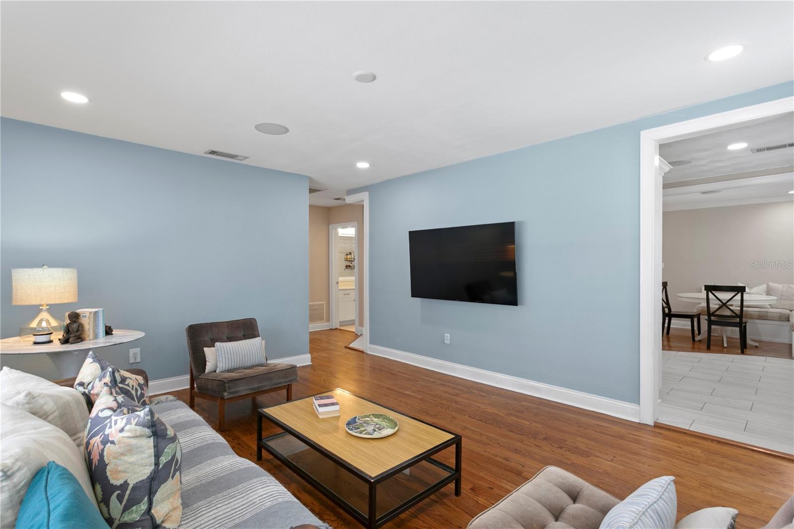 Living room opens into the kitchen