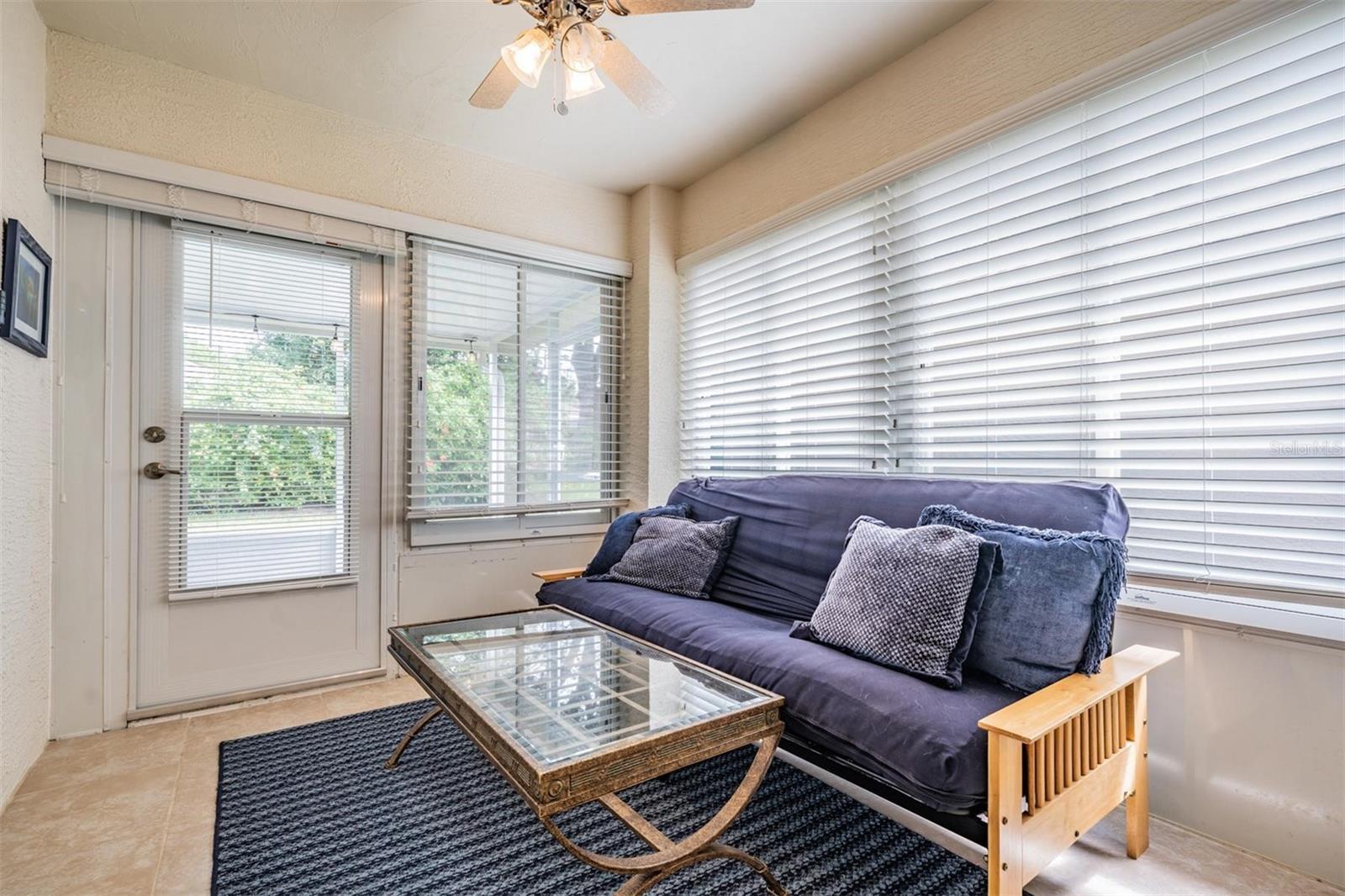 Enclosed sunroom with direct exterior access