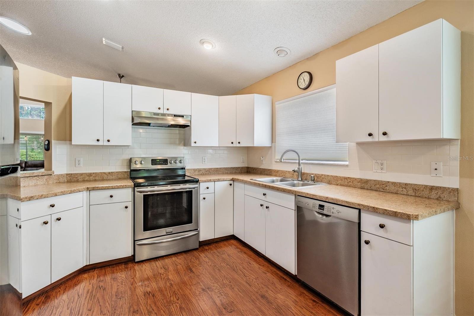 Kitchen with crisp, white cabinets