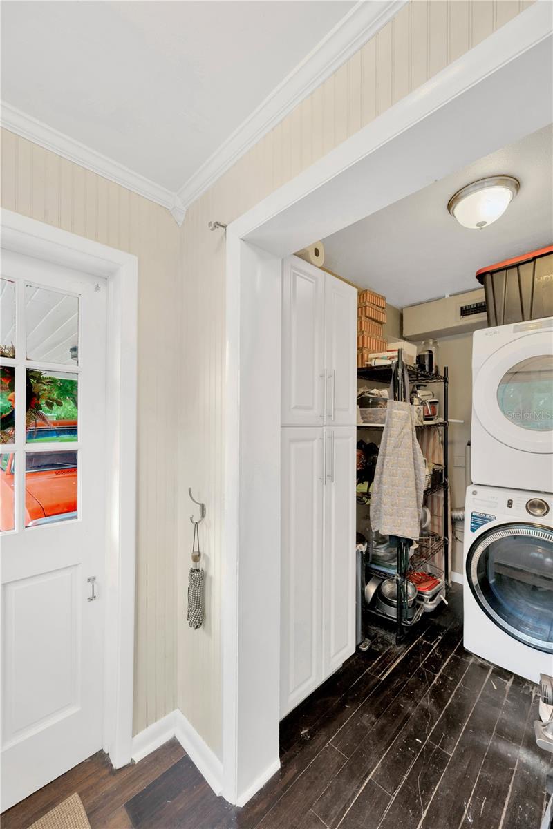 Utility Room Includes a Washer & Dryer