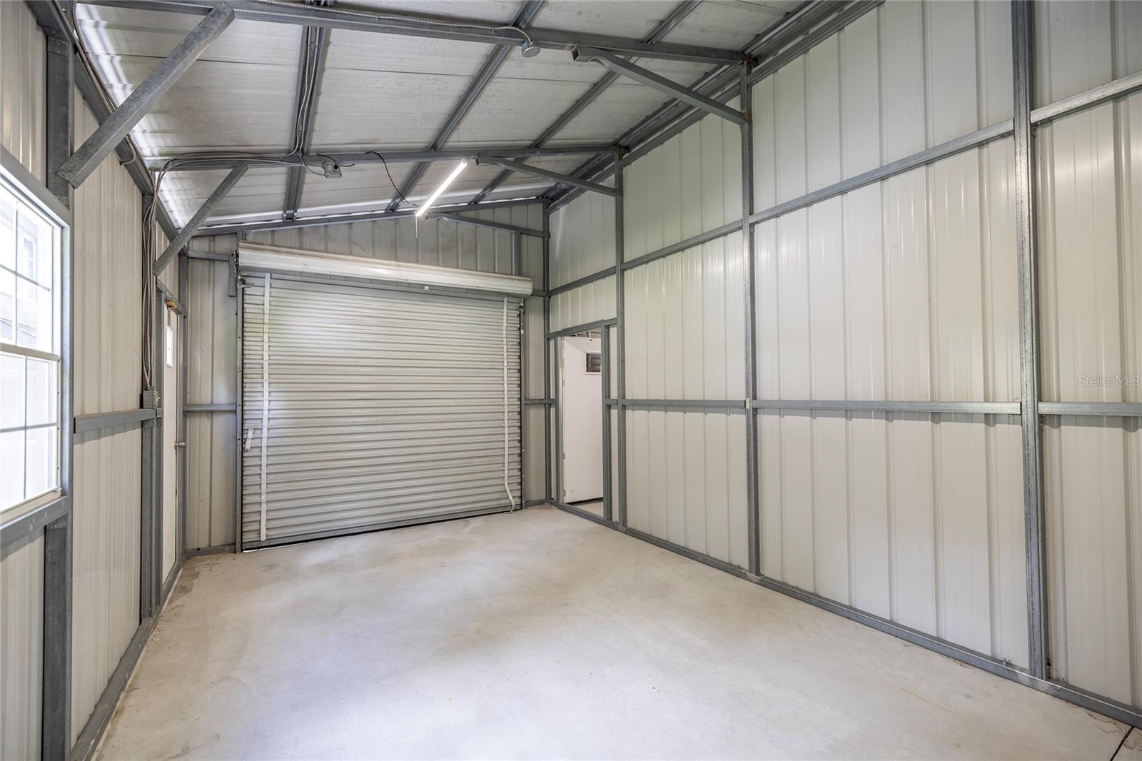Detached garage with 2 separate oversized one car stalls