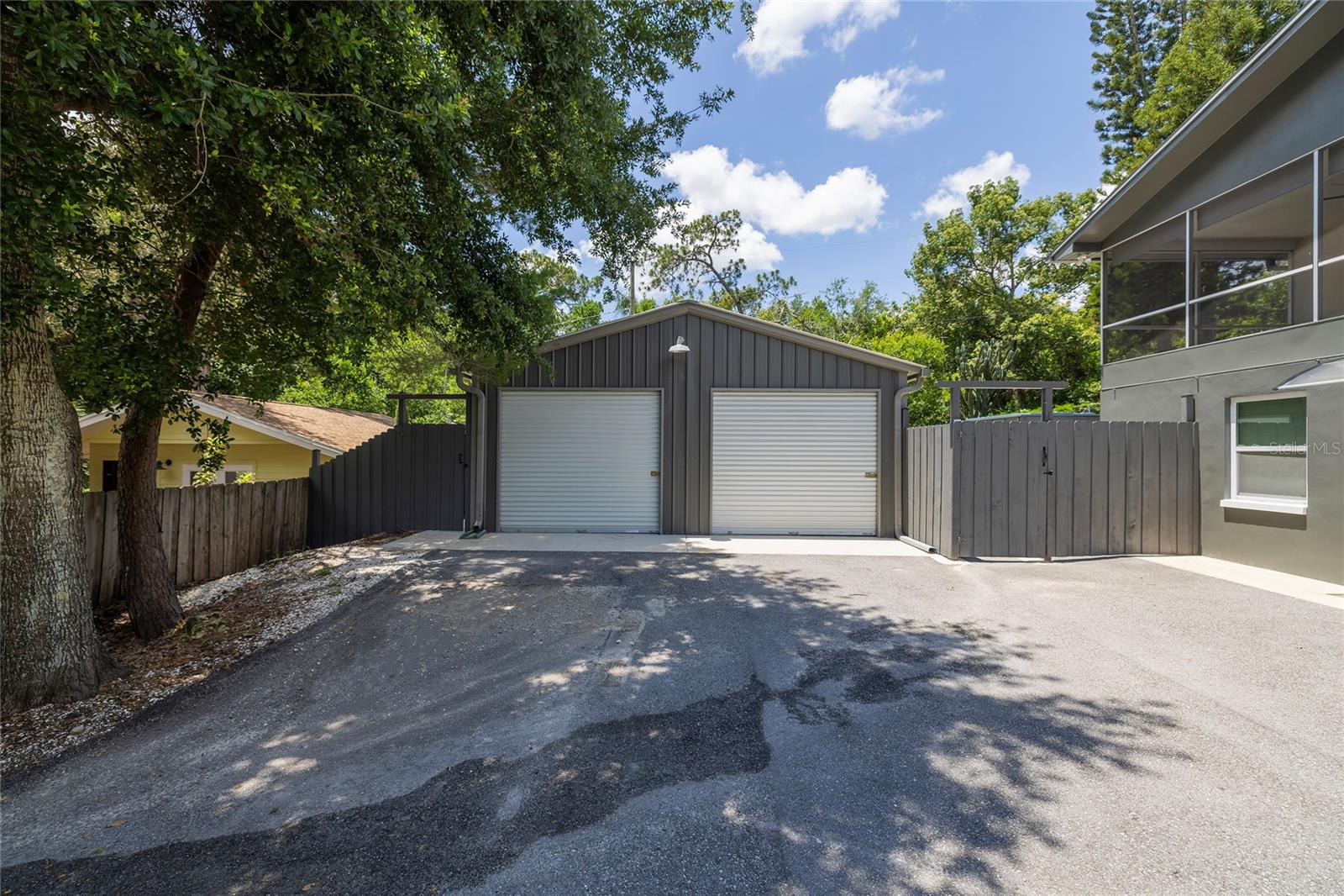 Detached 1024 sq ft  2 car garage with large open room in back with plumbing for bathroom