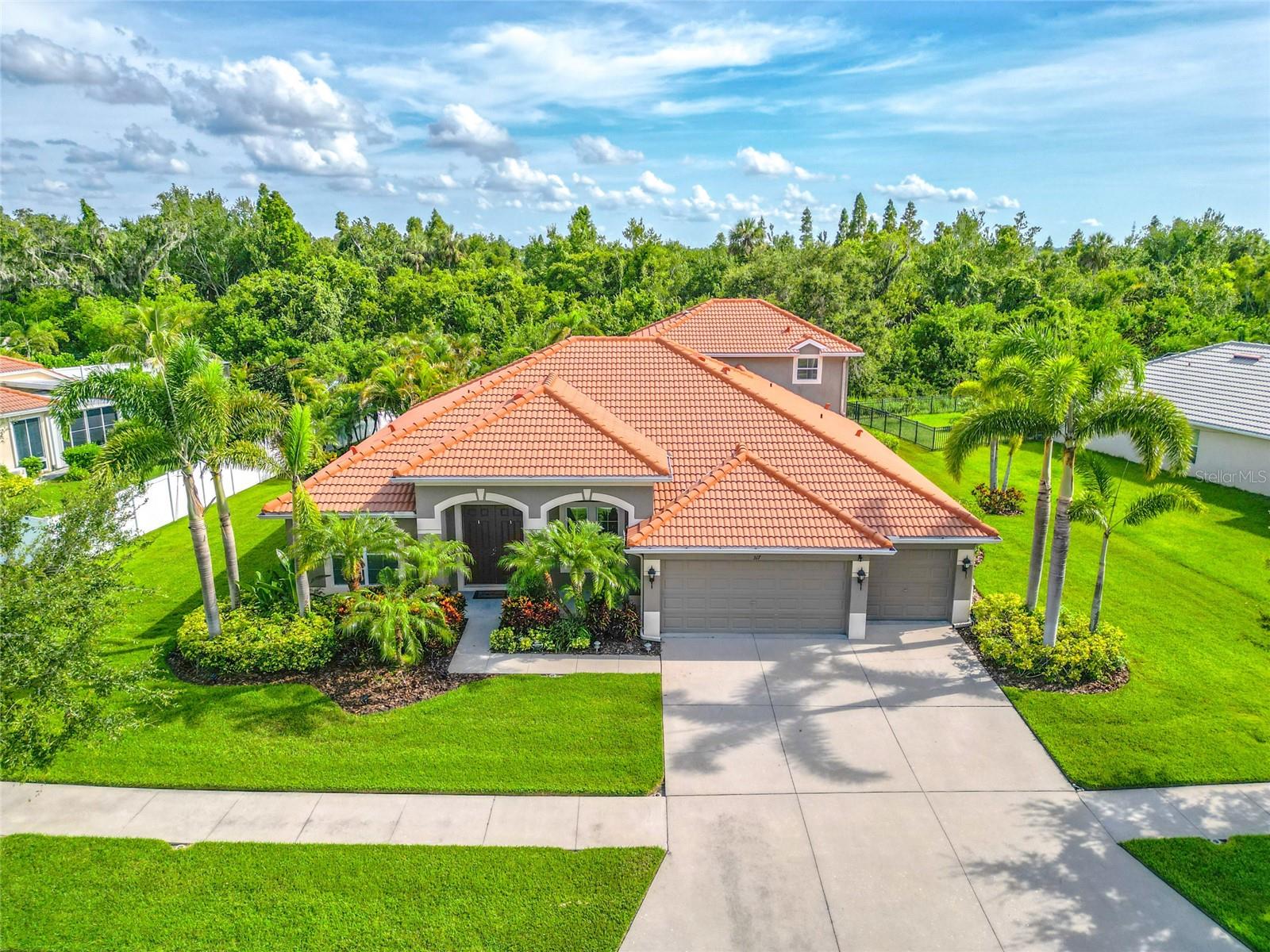 The property backs up to a Conservation Area, which means no neighbors in the rear.