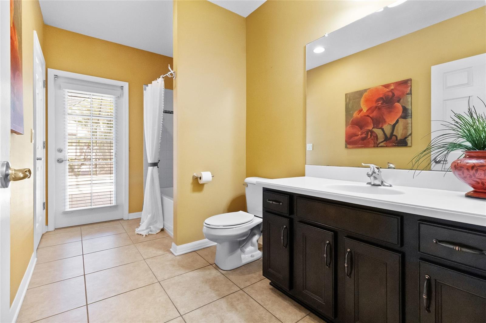 3rd Full Bath with access to the pool area.