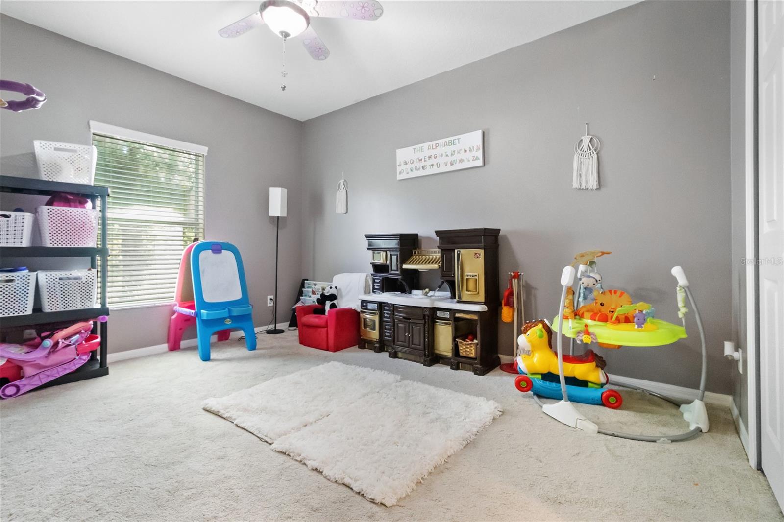 Secondary bedroom number 2. Features a huge walk in closet and is also served by the Jack n Jill bathroom.