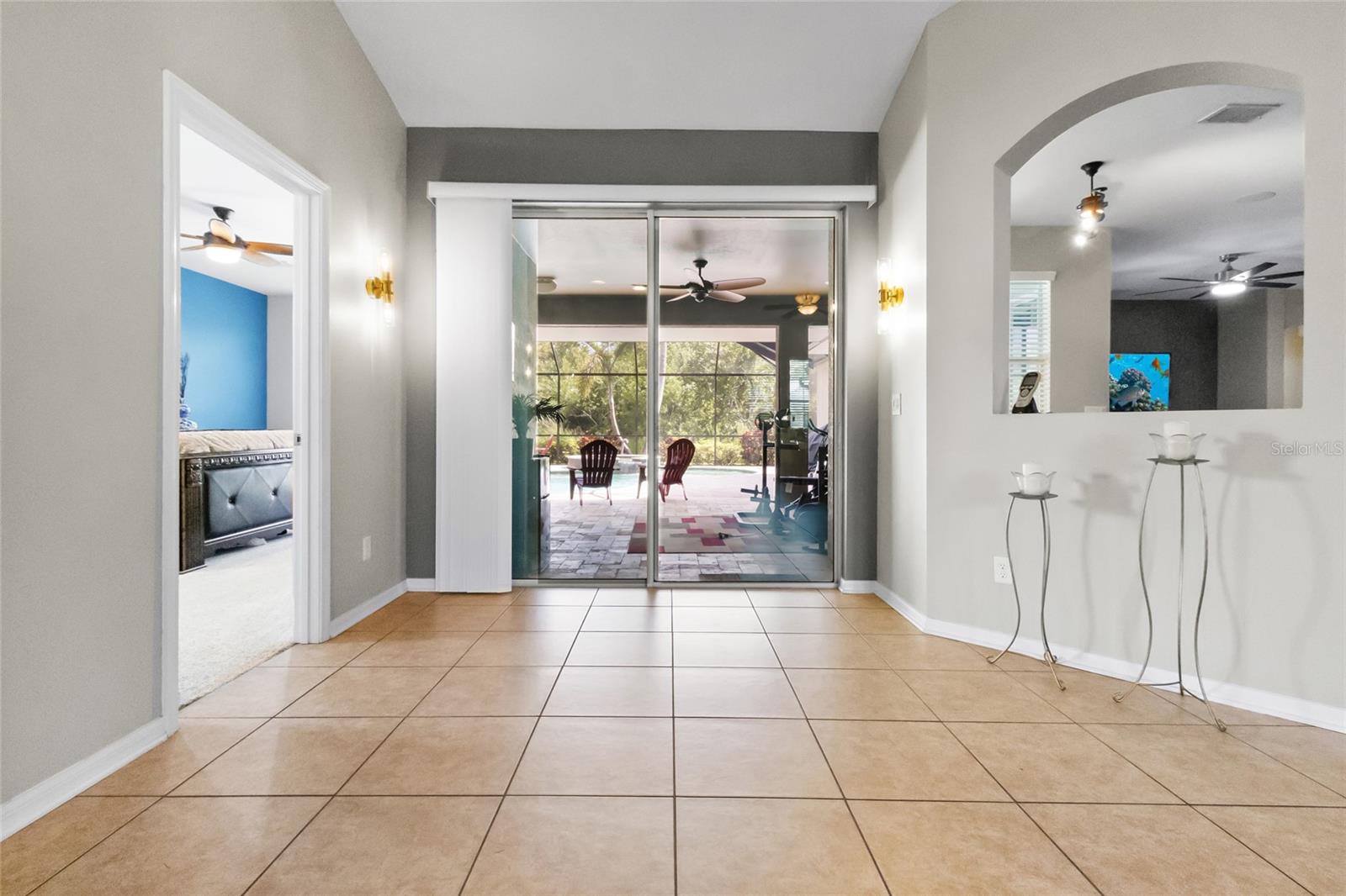 3 sliders serve this home. Split Bedroom floor plan with Primary quarters shown to the left.