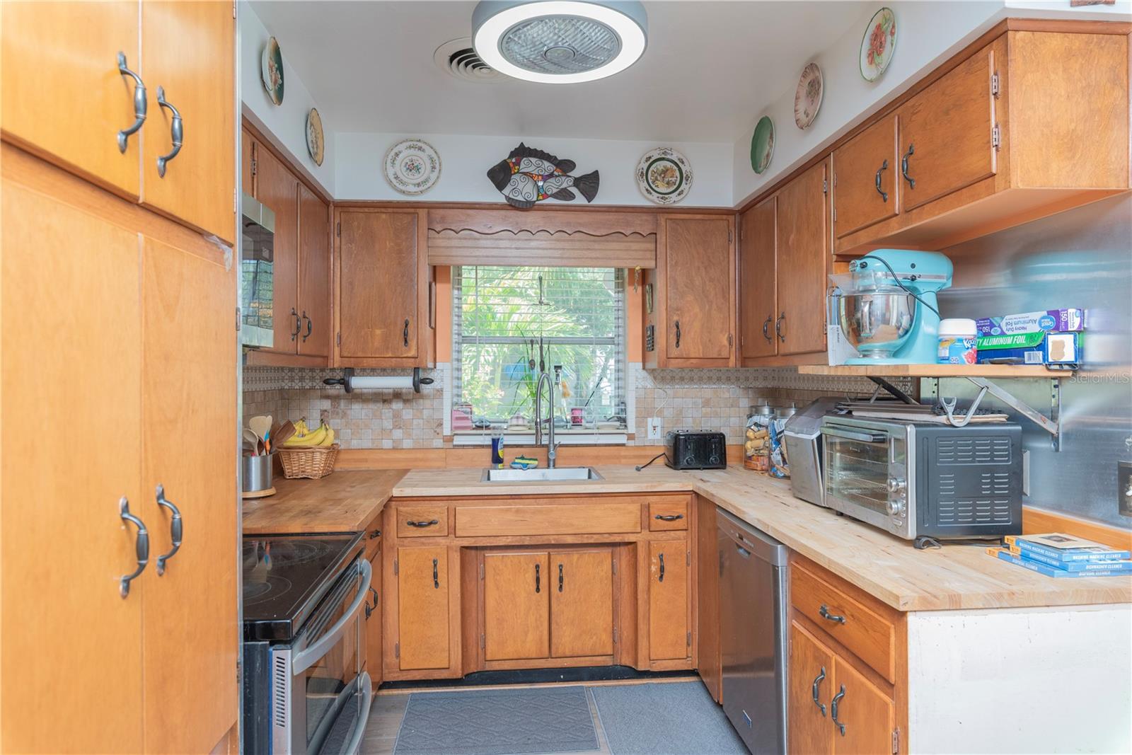 Kitchen with stainless steel appliances.