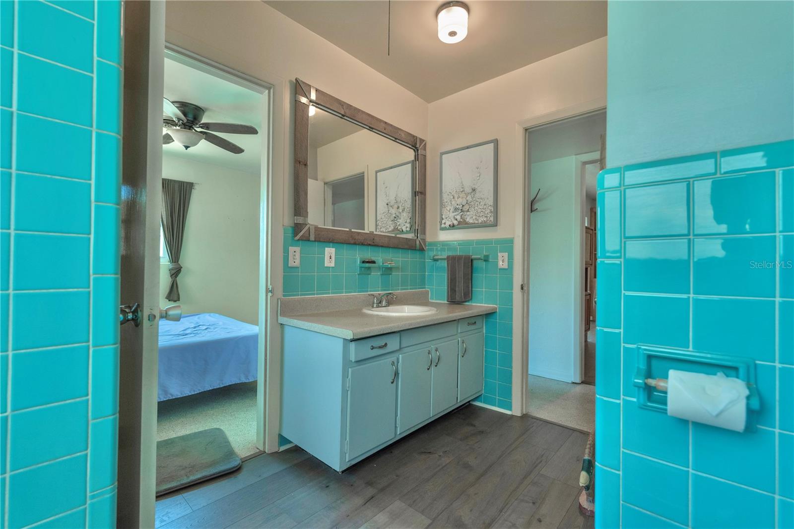 Guest bathroom connects to the hallway and bedroom 2.