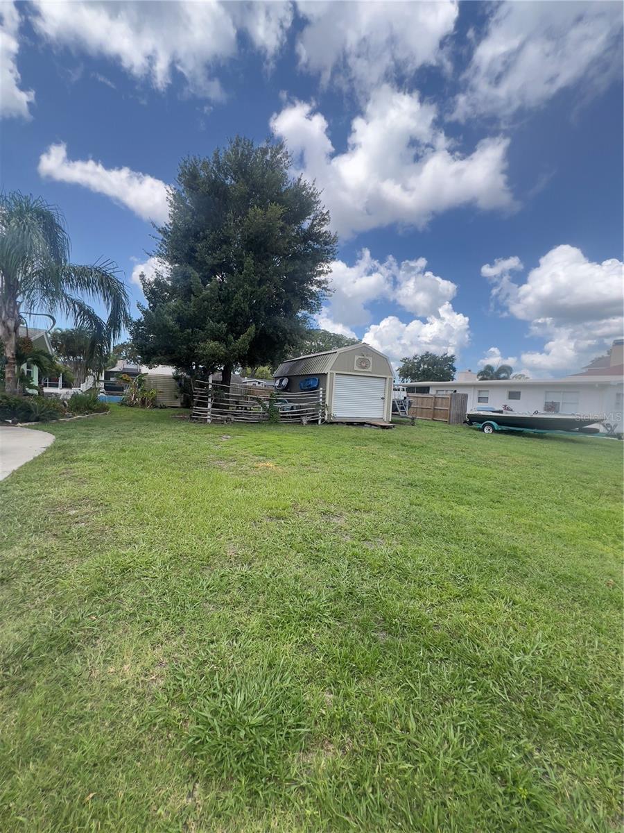 Right side of property (vacant lot side).