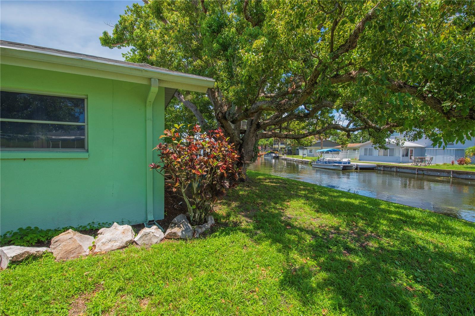 Right side of house with canal view.