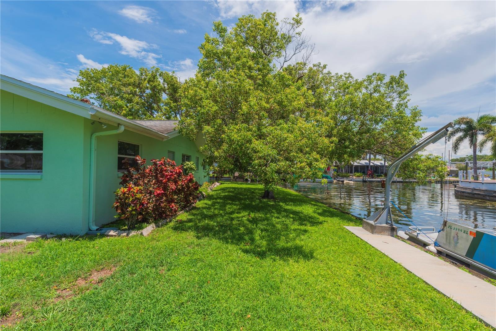 Right side of house with canal view.