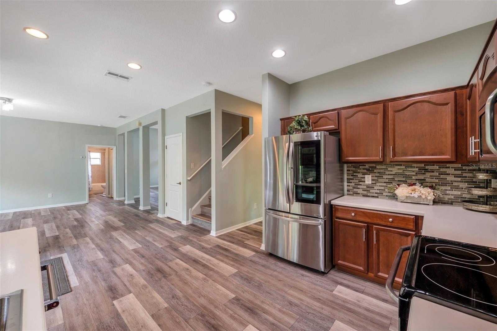 Kitchen has a walk-in pantry.