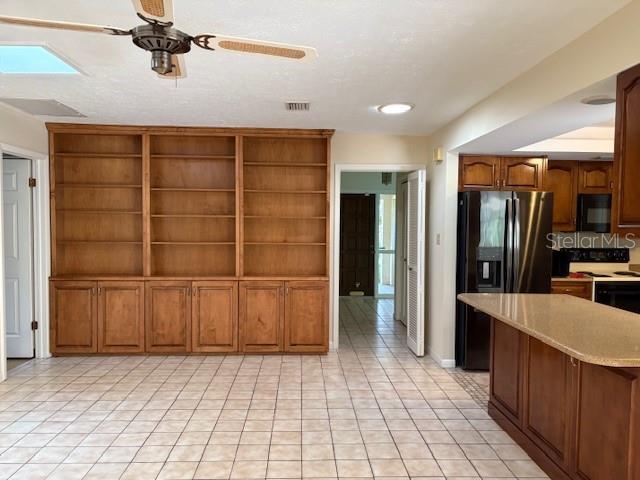 family room - build in shelving