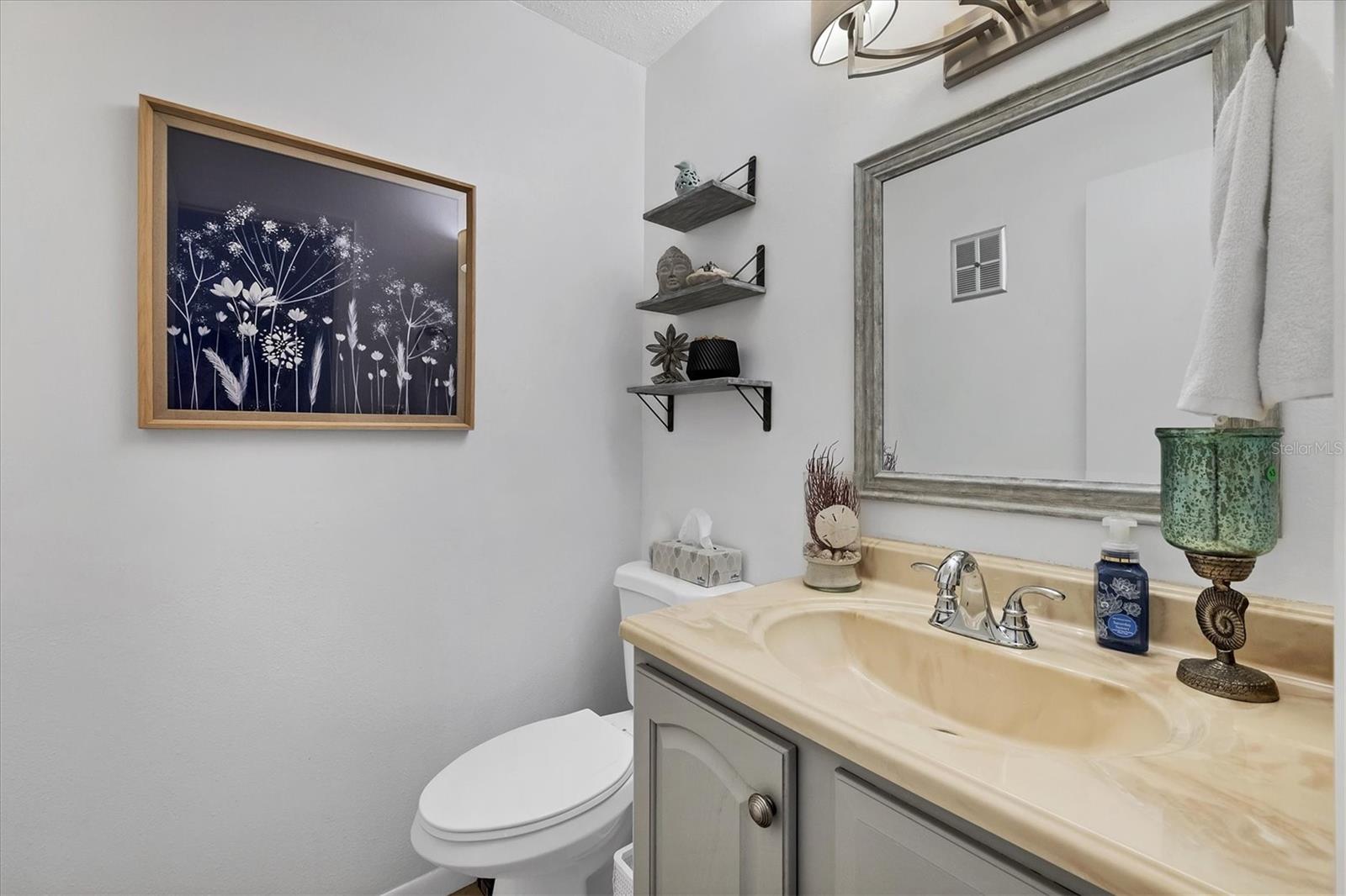 Half bath so your guests don't have to go through your bedroom. There aren't many with a 1/2 bath in this community.