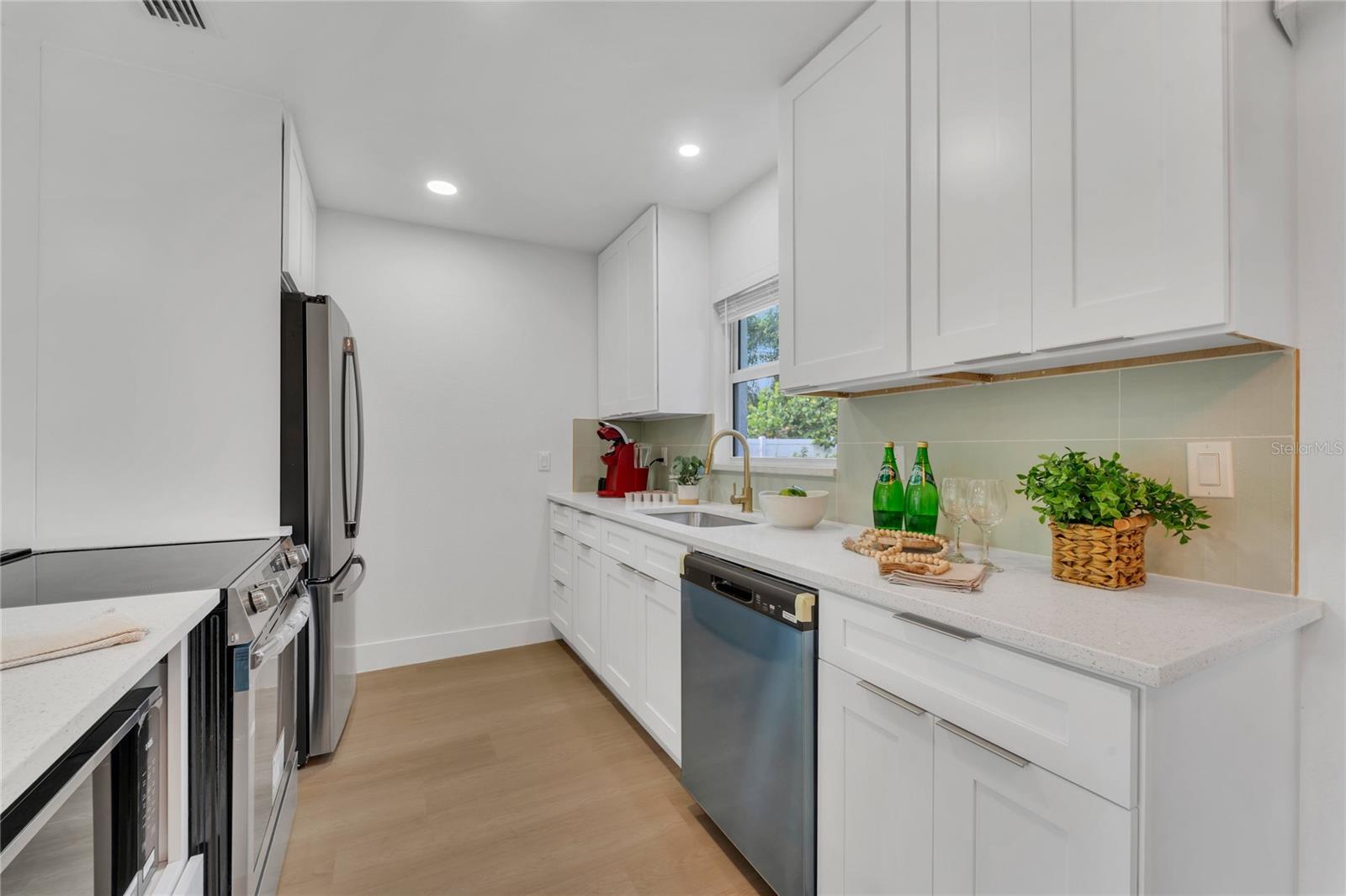 Updated kitchen with brand new appliances.
