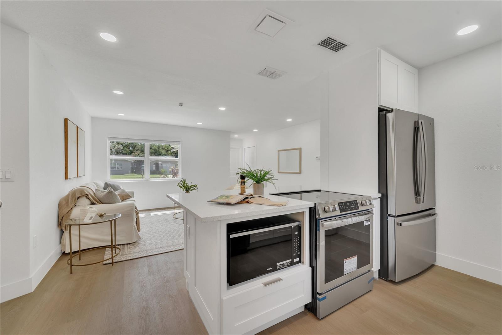 Updated kitchen with brand new appliances.