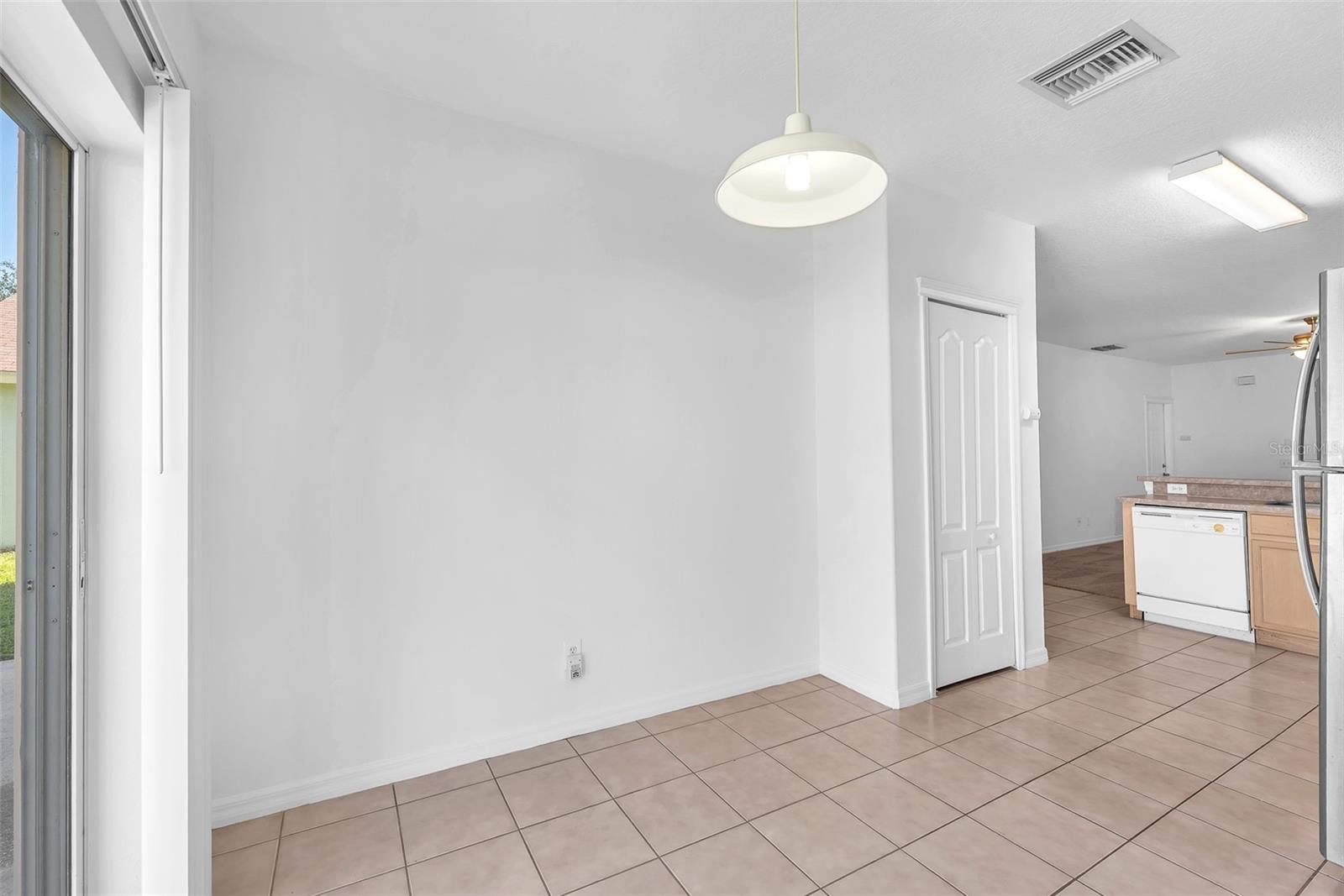 Eat in kitchen area with pantry
