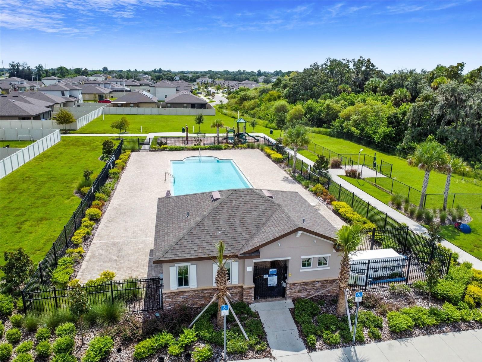Clubhouse with community pool and dog park