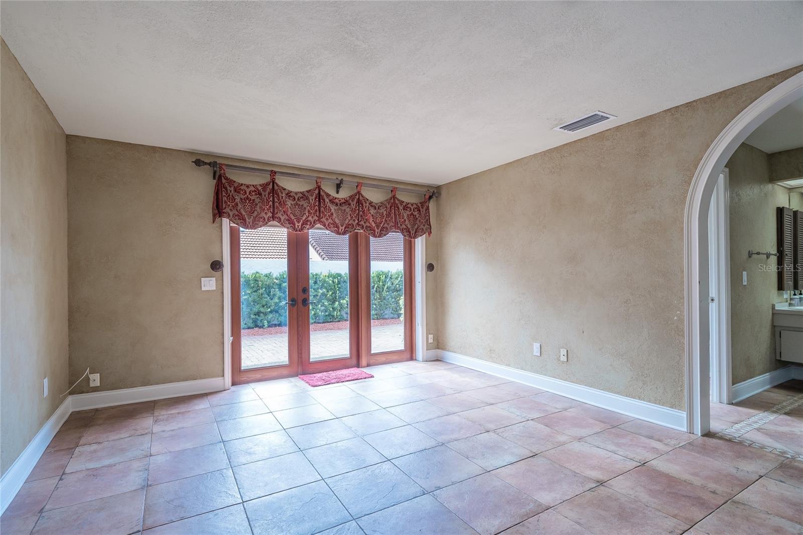 master bedroom with French doors