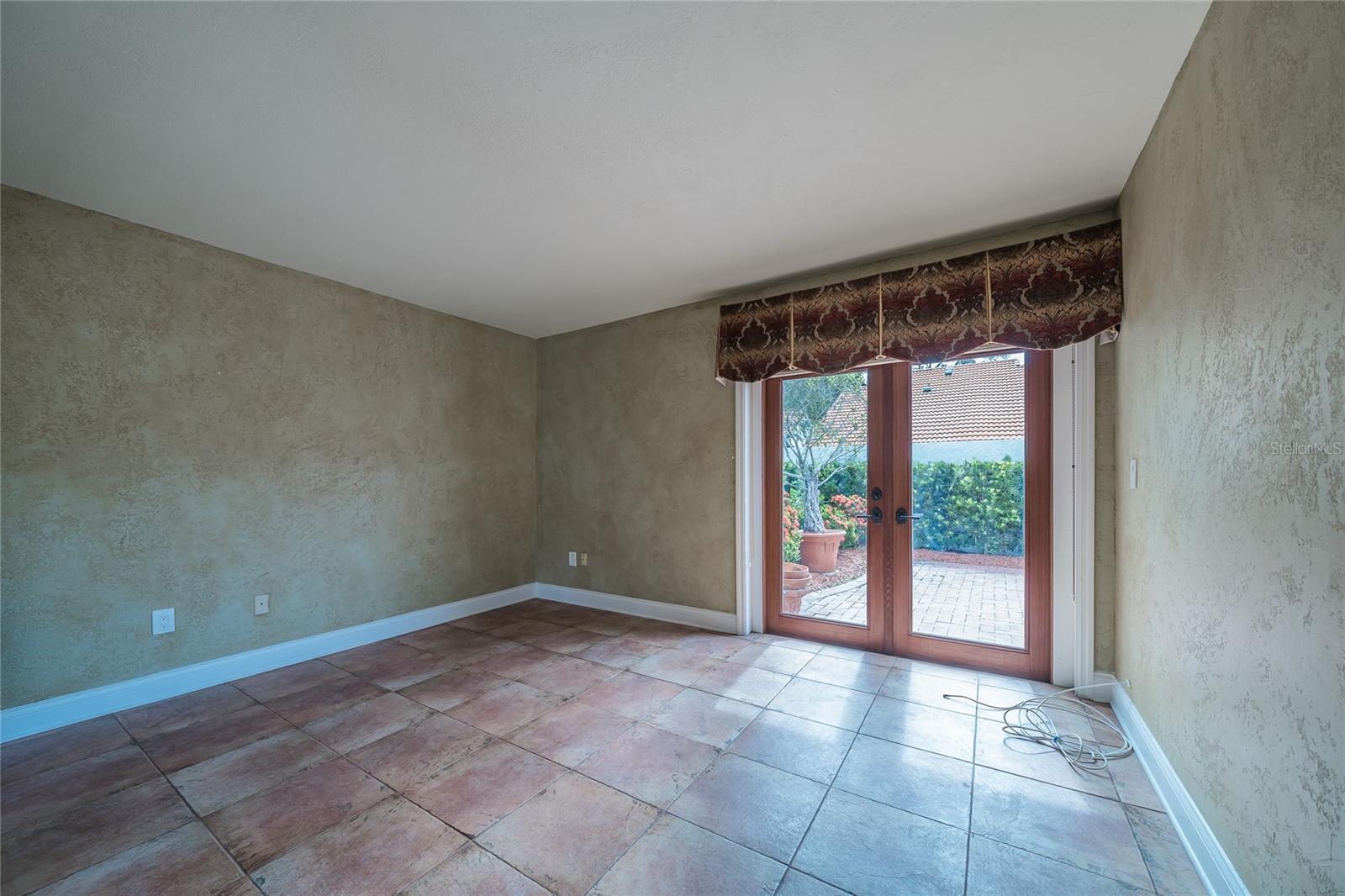 French door from bedroom to rear courtyard