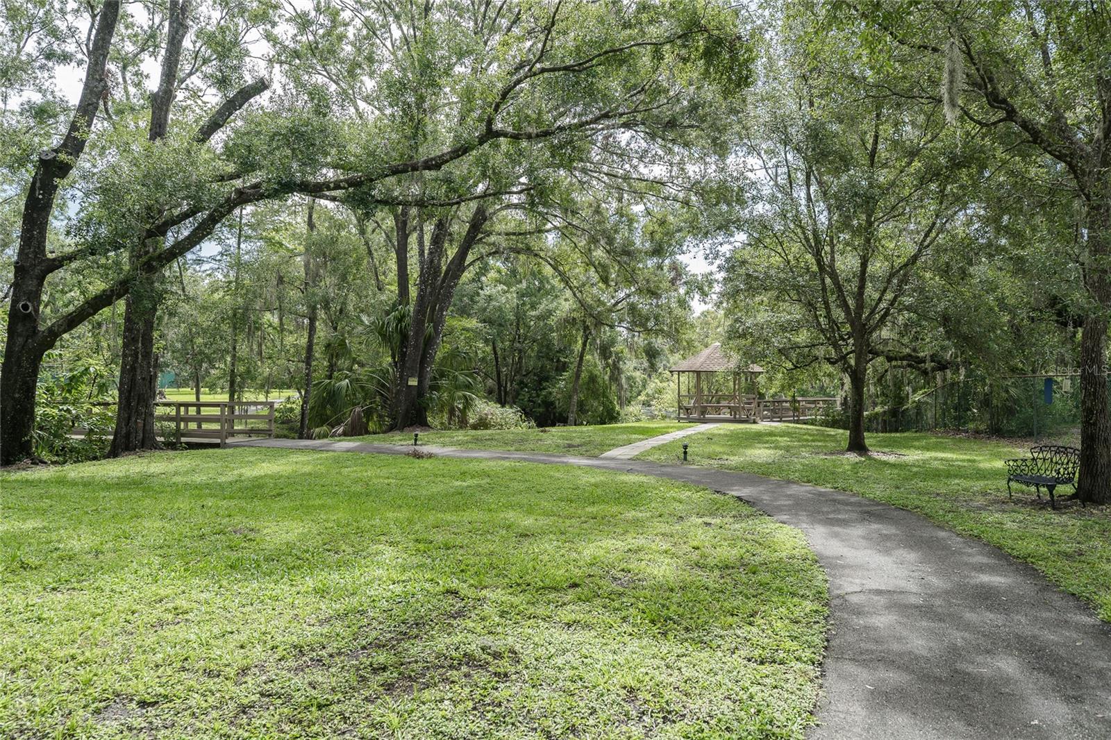 view of path, bridge and gazebo