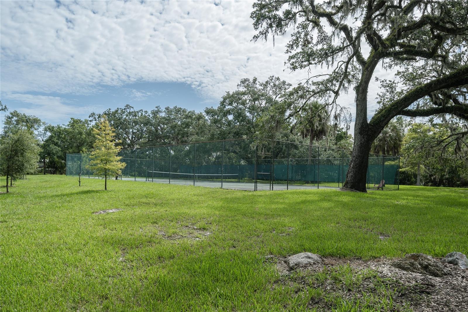 Tennis court in park