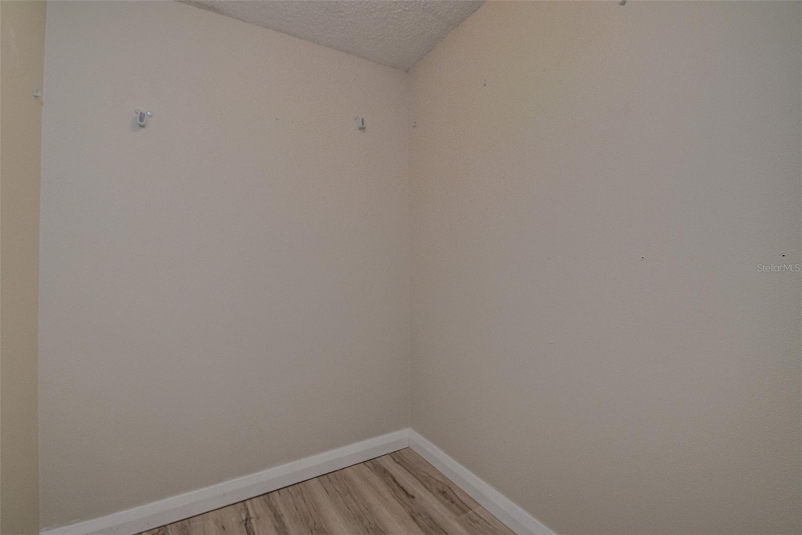 Primary Bedroom walkin closet
