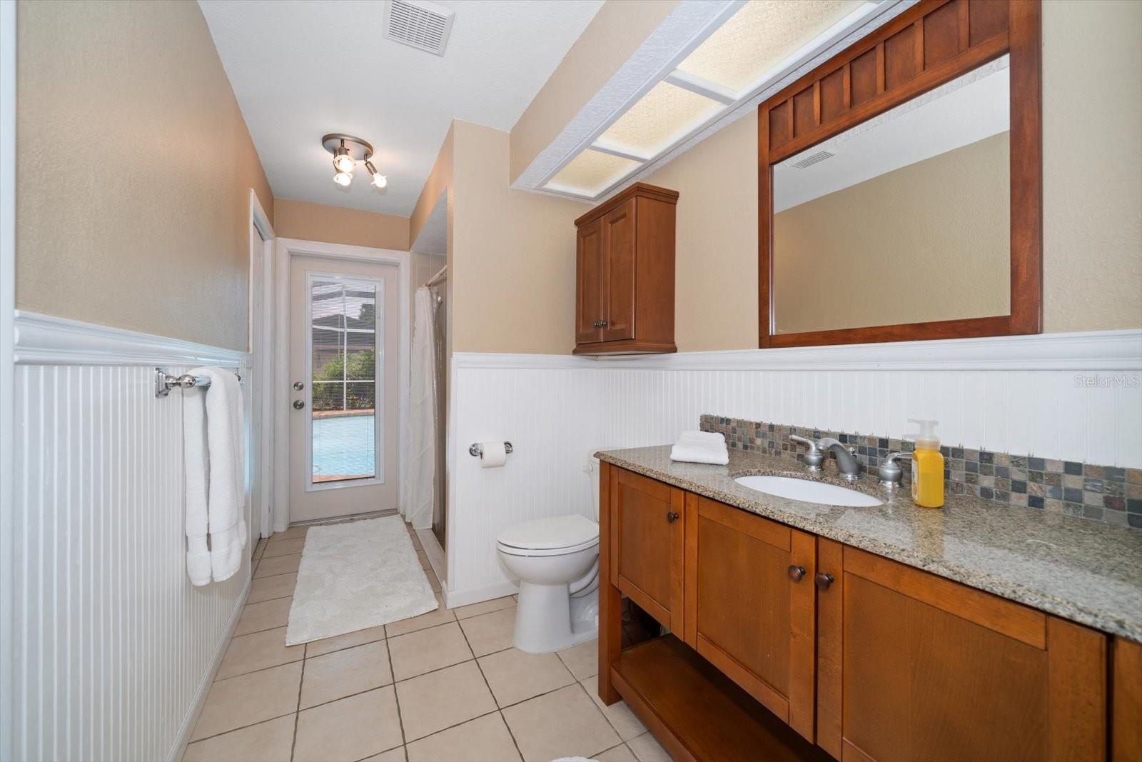 Bathroom #3 with door to pool